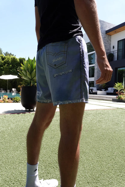 Rear on-body fit of JORTS in a backyard volleyball setting